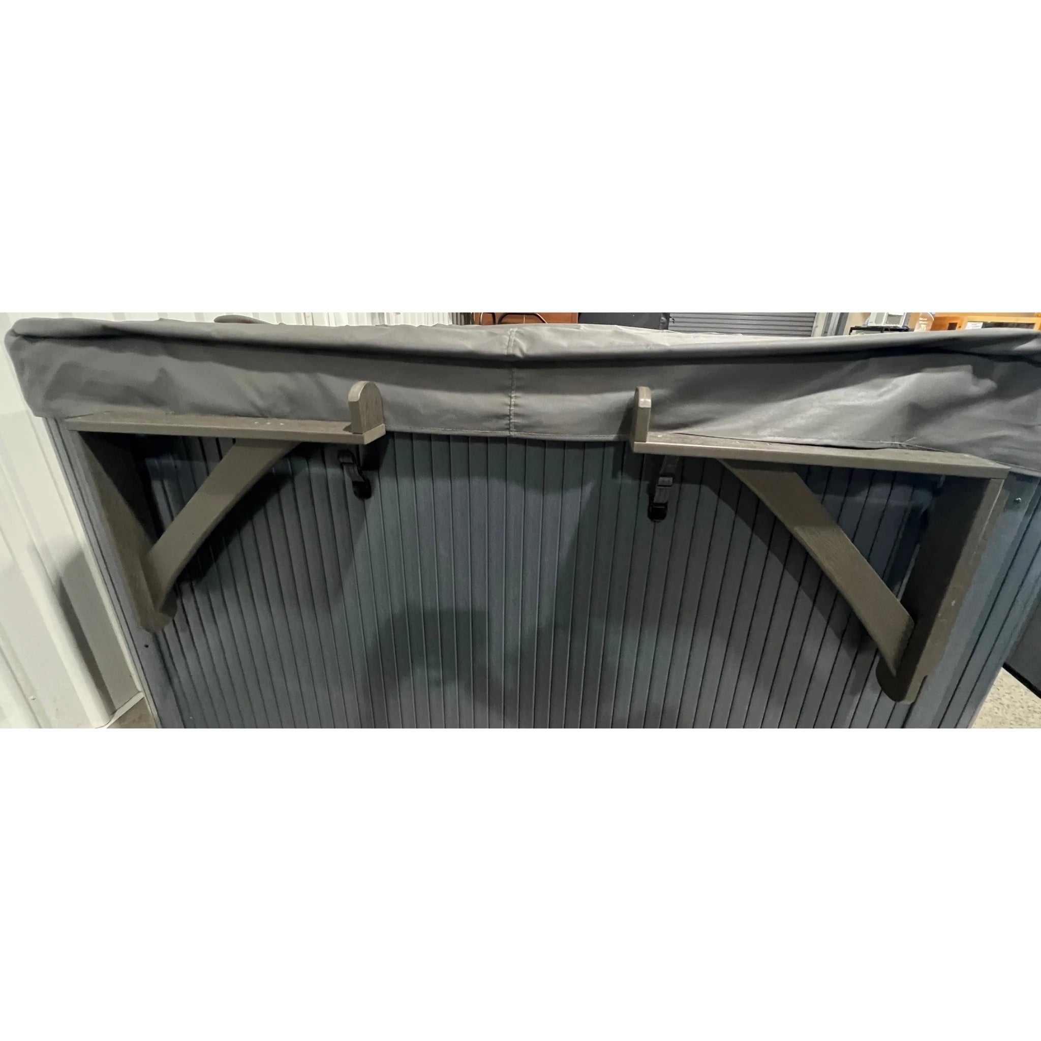 Rolling spa cover bracket cabinet mount, shown in closed position.