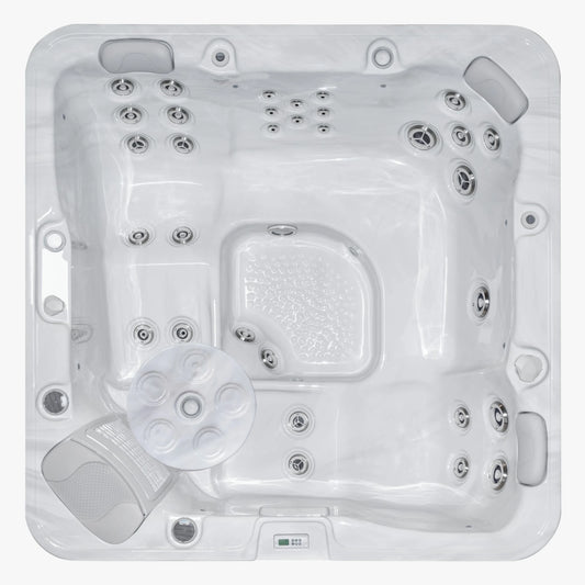 Top view of IOST218 portable spa with control panel and jets visible