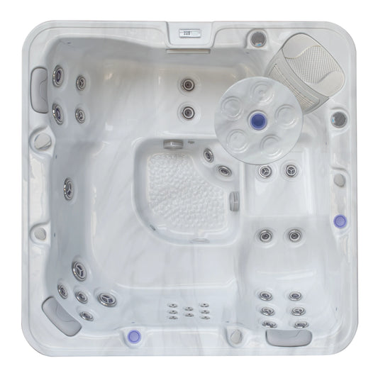 Top view of IOST218 portable spa with control panel and jets visible