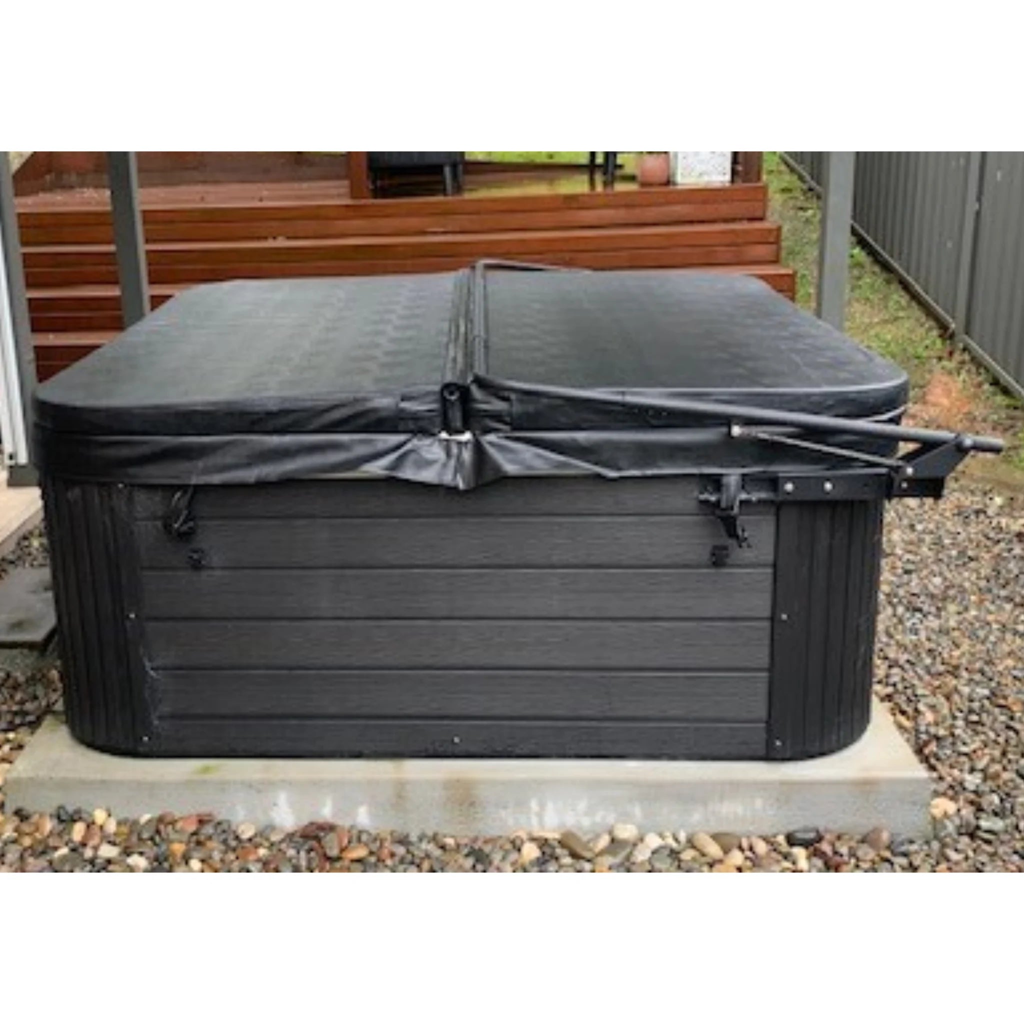 Ezy Lifter cabinet mount spa cover holder shown in closed position securely covering the spa.