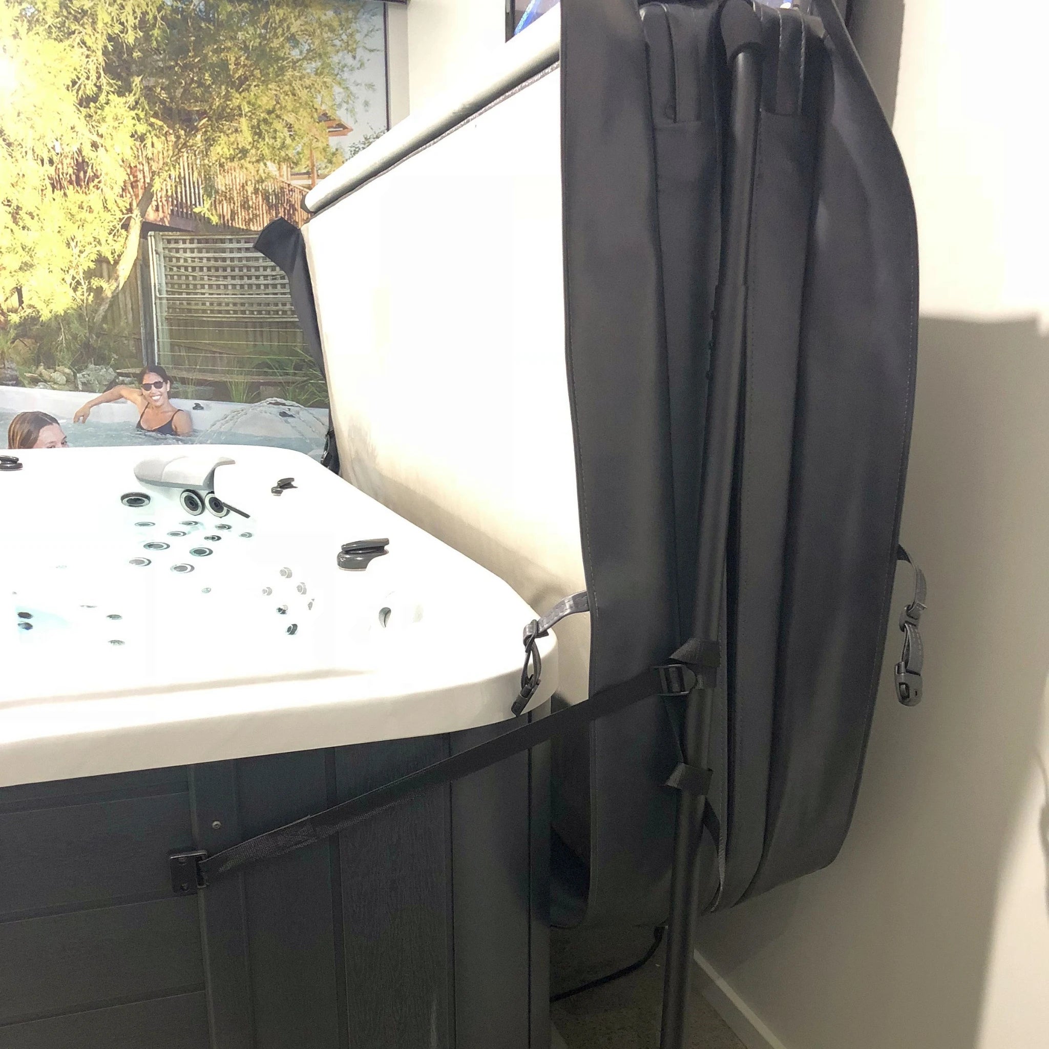 Ezy lifter shown in operation, stores spa cover off the spa and out of the way. Requires installation.