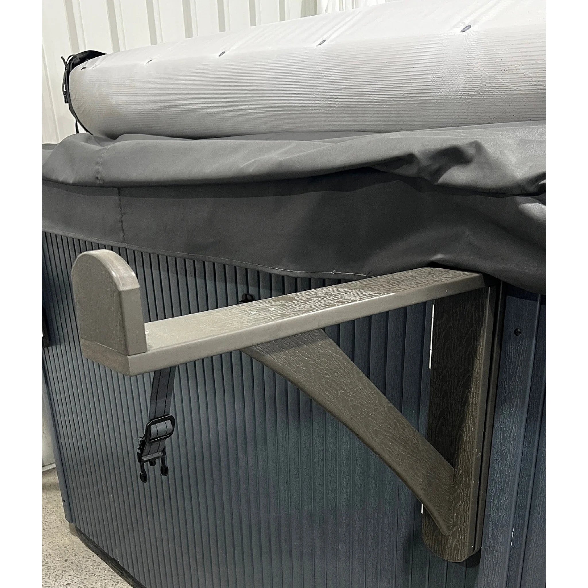 Rolling spa cover bracket cabinet mount, shown in open position.
